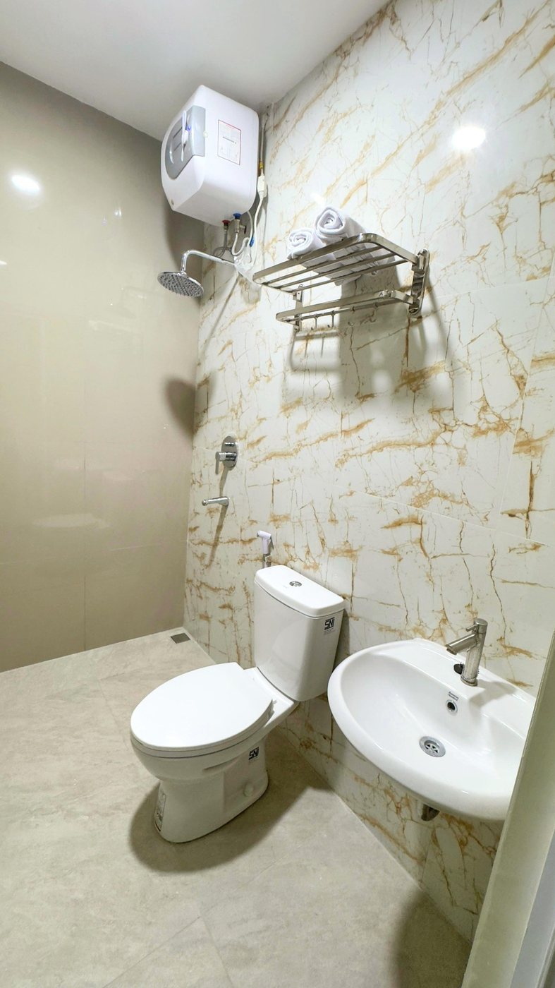 Kamar mandi Deluxe Nganjuk Family Guest House